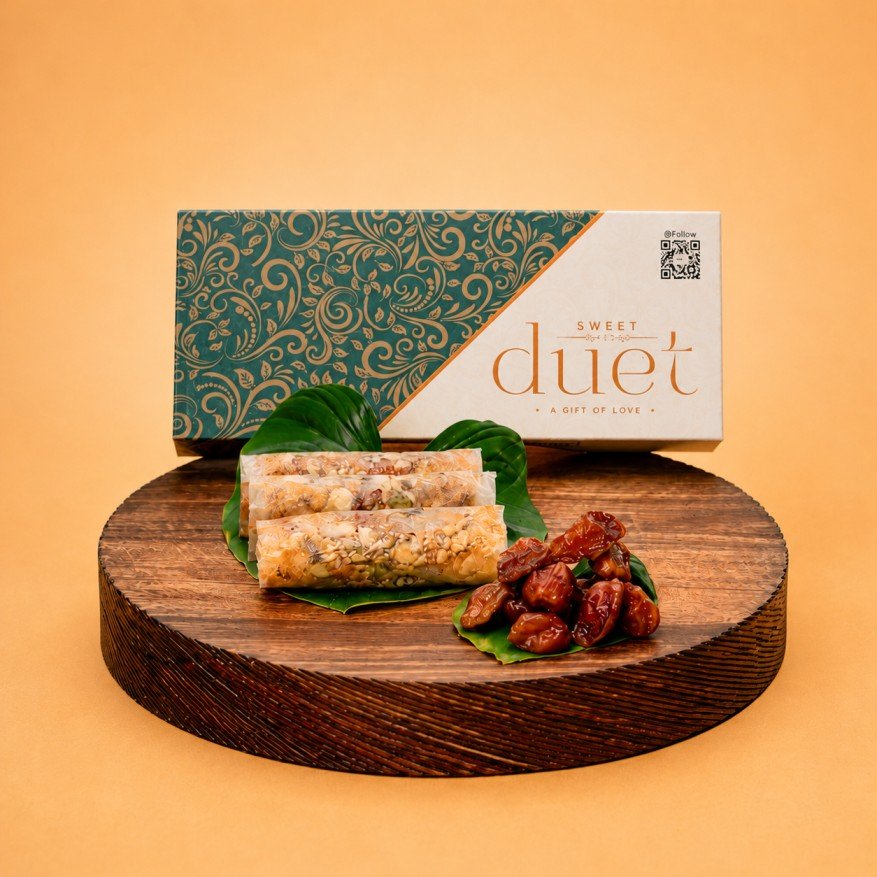 Experience handcrafted Atreyapuram Putharekulu layered with premium dates, cashews, almonds, pistachios, delicate rice starch sheets, and balanced sweetness crafted for luxurious gifting and rich fusion sweet indulgence.